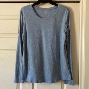 Eddie Bauer shirt. Long sleeve. Curved at bottom.